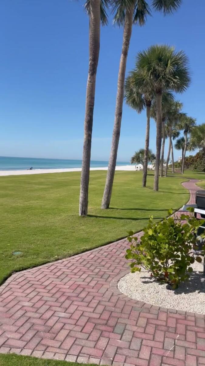 Pool And Gulf At Sunset